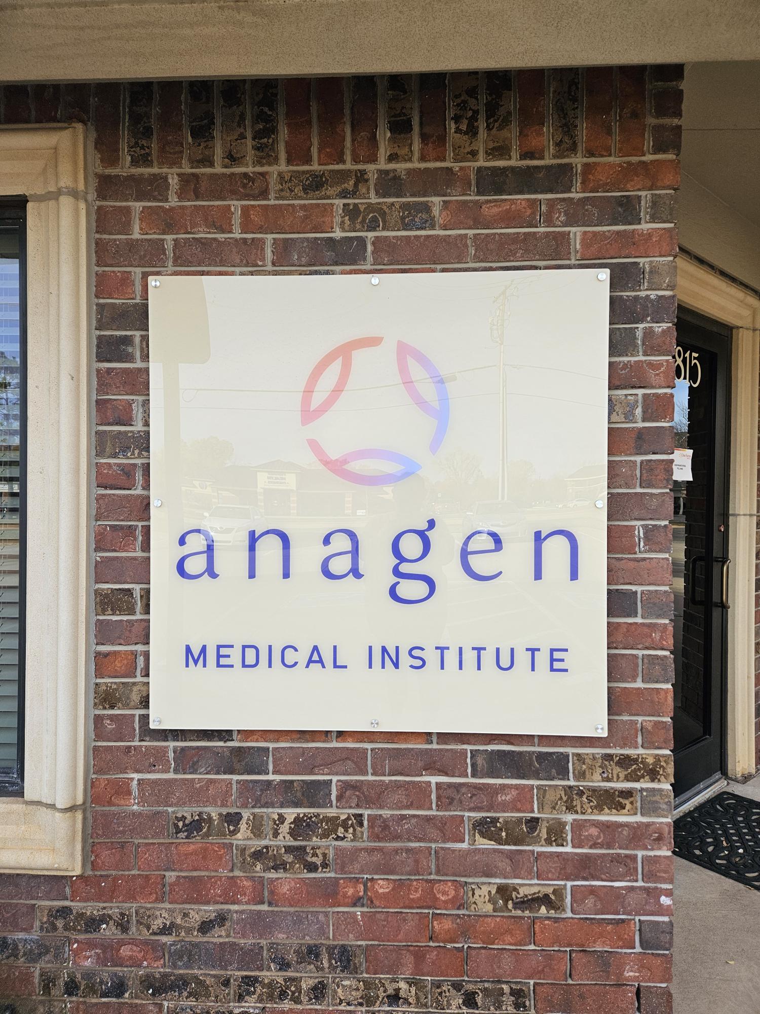 Clear exterior signage with Anagen branding